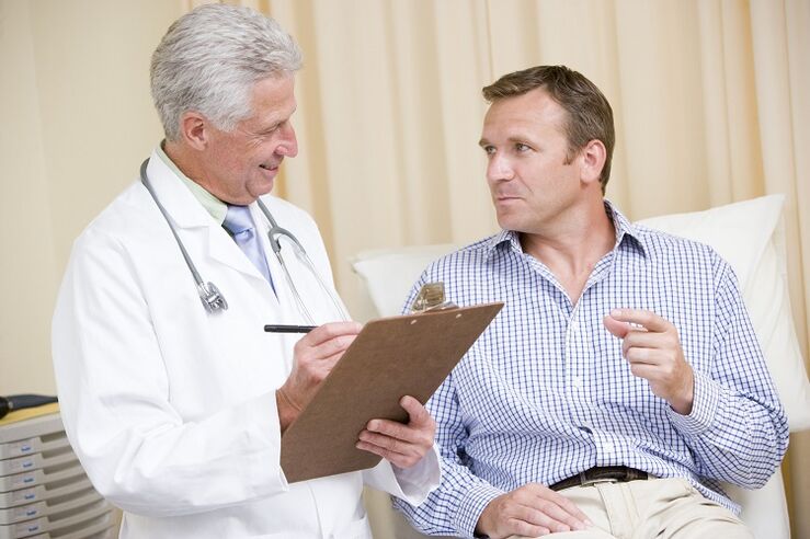 Doctor and patient before penis enlargement surgery.